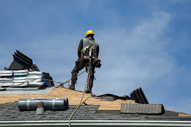 Professional Roof Replacement technician working in Yates City, IL